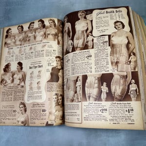 May include: A vintage catalog page featuring women's undergarments and corsets. The page includes a variety of styles, including girdles, side-lacers, and girdle-type belts. The text on the page includes the brand name "Gale" and prices for each item.