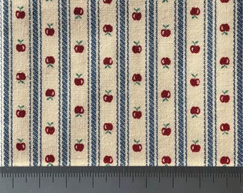 Tiny apples on cream with blue stripe