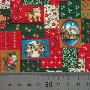 May include: A red, green and white fabric with a patchwork design featuring various Christmas-themed images, including Santa Claus, a cat, a cabin and birds. The fabric is measured with a ruler in inches.