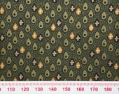 Green cotton print with egg shapes. Small scale cotton print.
