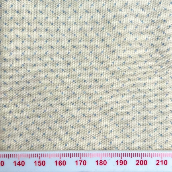 Tiny pale blue pattern on cream cotton. Great for small scale crafts, miniatures and patchwork.