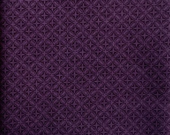 Dark purple circle pattern on a purple cotton background. Perfect for small scale crafts
