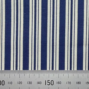 May include: A close-up of a blue and white striped fabric. The fabric is measured with a ruler that shows 150 centimetres.