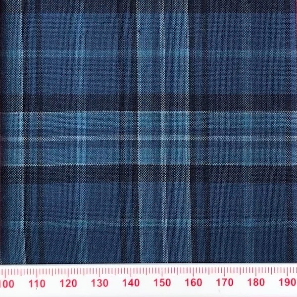 Various shades of blues classic plaid cotton print.