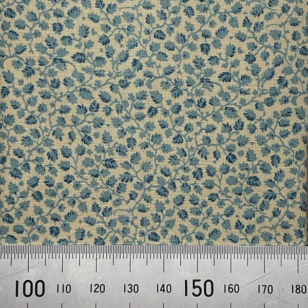 Blue leaf design on beige cotton. Great for small scale crafts, miniatures and patchworks.