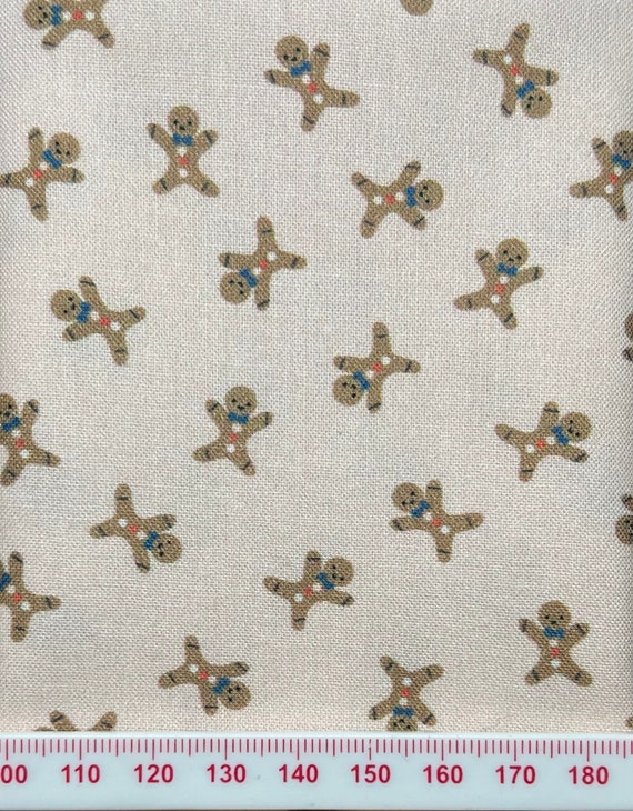 Winzige Lebkuchenmännchen auf zartrosa Ideal für