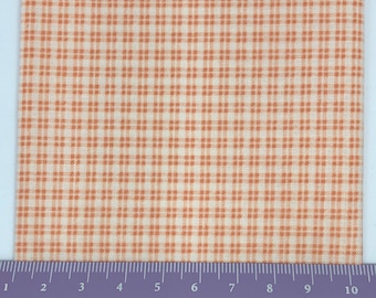 Tiny peach check cotton fabric. Perfect for 1/12th scale dolls house
