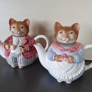 Whimsical cat teapots (2) Him & Her tea pots, hand painted, Buthe Germany.