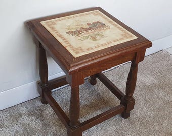 Oak plant stand with ceramic tile (depiction of coach(