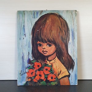 May include: A painting of a young girl with long brown hair and large brown eyes. She is wearing a yellow dress and holding a bouquet of red flowers. The background is a light blue with white streaks.