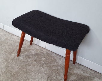 Vintage curved footstool, black upholstery, 1950s or 1960s