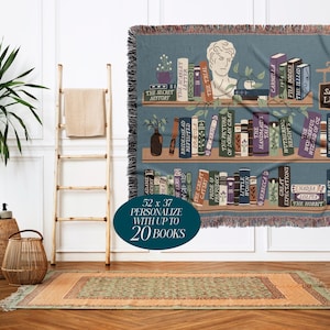 May include: A blue throw blanket with a bookshelf design, featuring book titles and a bust. The blanket measures 52 x 37 inches. It includes the text "Samantha's Library" and can be personalized with up to 20 books.