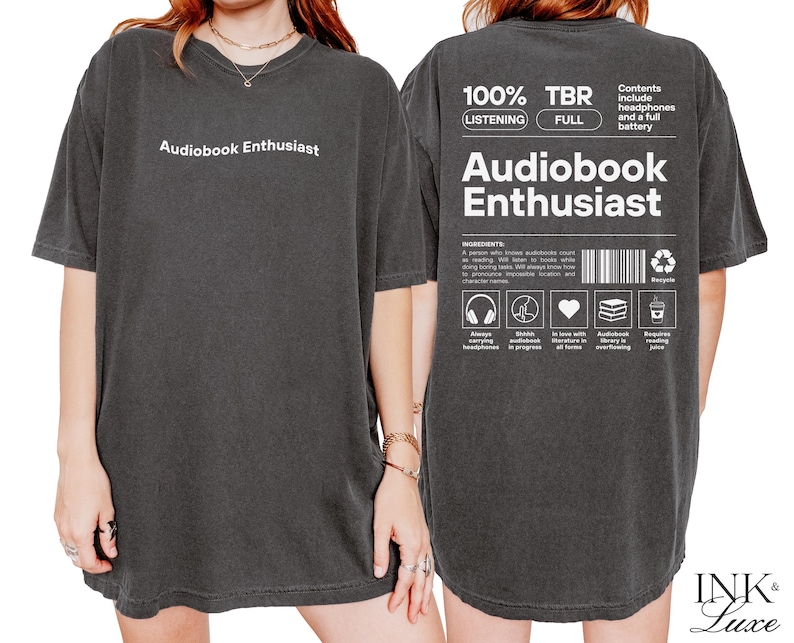 May include: Black oversized t-shirt with white text that reads "Audiobook Enthusiast" on the front and "100% TBR (LISTENING FULL) Audiobook Enthusiast" on the back. The back text also includes a list of features and a barcode.