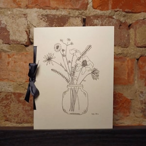 Fleurs sauvages dans un pot Mason
