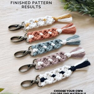 May include: Five macrame keychains in various colors, including white, orange, blue, purple, and black, with metal clasps and tassel accents. The text "FINISHED PATTERN RESULTS" and "CHOOSE YOUR OWN COLORS AND MATERIALS TO WORK WITH" are visible.