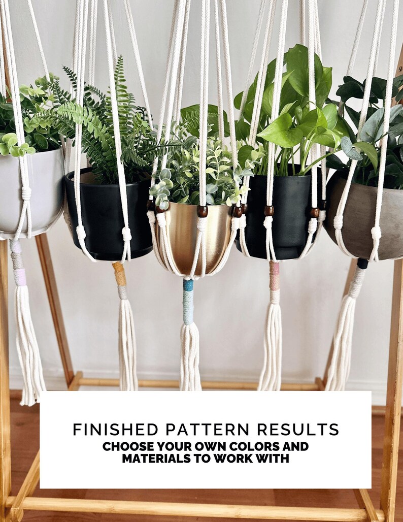 May include: Macrame plant hangers with various potted plants. The pots are in different colors, including black, gold, and gray. The macrame hangers have tassels and are suspended from a wooden stand. Text on the image reads: "FINISHED PATTERN RESULTS CHOOSE YOUR OWN COLORS AND MATERIALS TO WORK WITH."