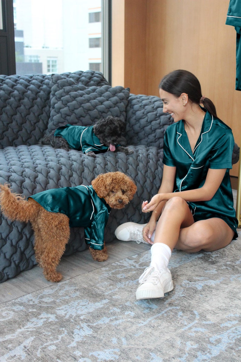 christmas pajamas for her and her dogs