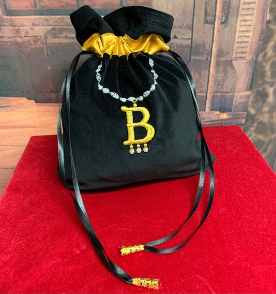 black drawstring evening bag