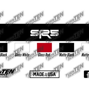 May include: A black and white decal with the text "SRS" in white letters. The decal is available in five different colors: gloss black, gloss white, gloss red, matte black, and matte white. The decal also includes the text "Made in the USA" and social media icons for Facebook and Instagram.
