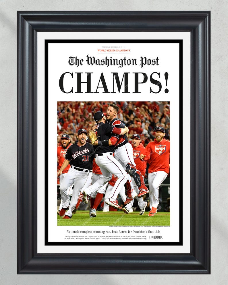 May include: A newspaper headline from The Washington Post announcing the Washington Nationals as World Series Champions. The headline reads "CHAMPS!" and features a photo of the Nationals celebrating their victory.