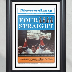 May include: A vintage newspaper front page with the headline "Four Straight" in white text on a blue background. The image shows a hockey player holding up the Stanley Cup trophy. The text below the headline reads "Islanders Sweep Oilers for Cup" and "See Page 2 and Sports Section".