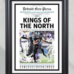 May include: Framed Detroit Free Press newspaper front page. Headline: "KINGS OF THE NORTH." Image shows a football game between the Detroit Lions and Minnesota Vikings. The score is 31-09. The frame is black.