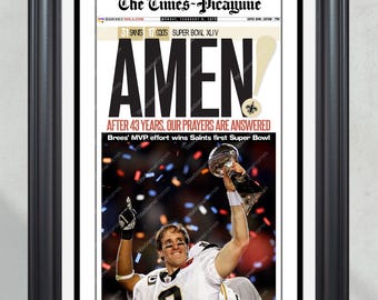 May include: A black and white newspaper front page with the headline "AMEN!" and the subheading "After 43 years, our prayers are answered". A photo of a football player holding up the Super Bowl trophy is in the bottom right corner.