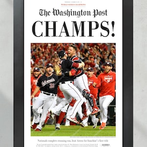 May include: The Washington Post newspaper front page headline reads "CHAMPS!" with a photo of the Washington Nationals baseball team celebrating their World Series victory. The headline reads "Nationals complete stunning run, beat Astros for franchise's first title."