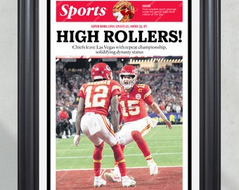 May include: Framed print of a newspaper sports page. The headline reads "HIGH ROLLERS!" with a photo of two football players in red and yellow uniforms. The text mentions Super Bowl LVIII and the Kansas City Chiefs.