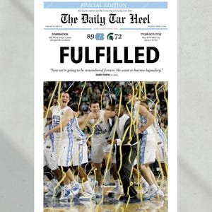 May include: A newspaper headline reads "FULFILLED" with the text "Now we're going to be remembered forever. We want to become legendary."  The headline is above a photo of a basketball team celebrating their victory. The team is wearing blue and white uniforms and is covered in confetti. The score of the game is shown as 89 to 72.
