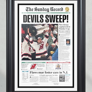 Stampa incorniciata della prima pagina del giornale dei campioni della Stanley Cup dei NJ Devils del 1995