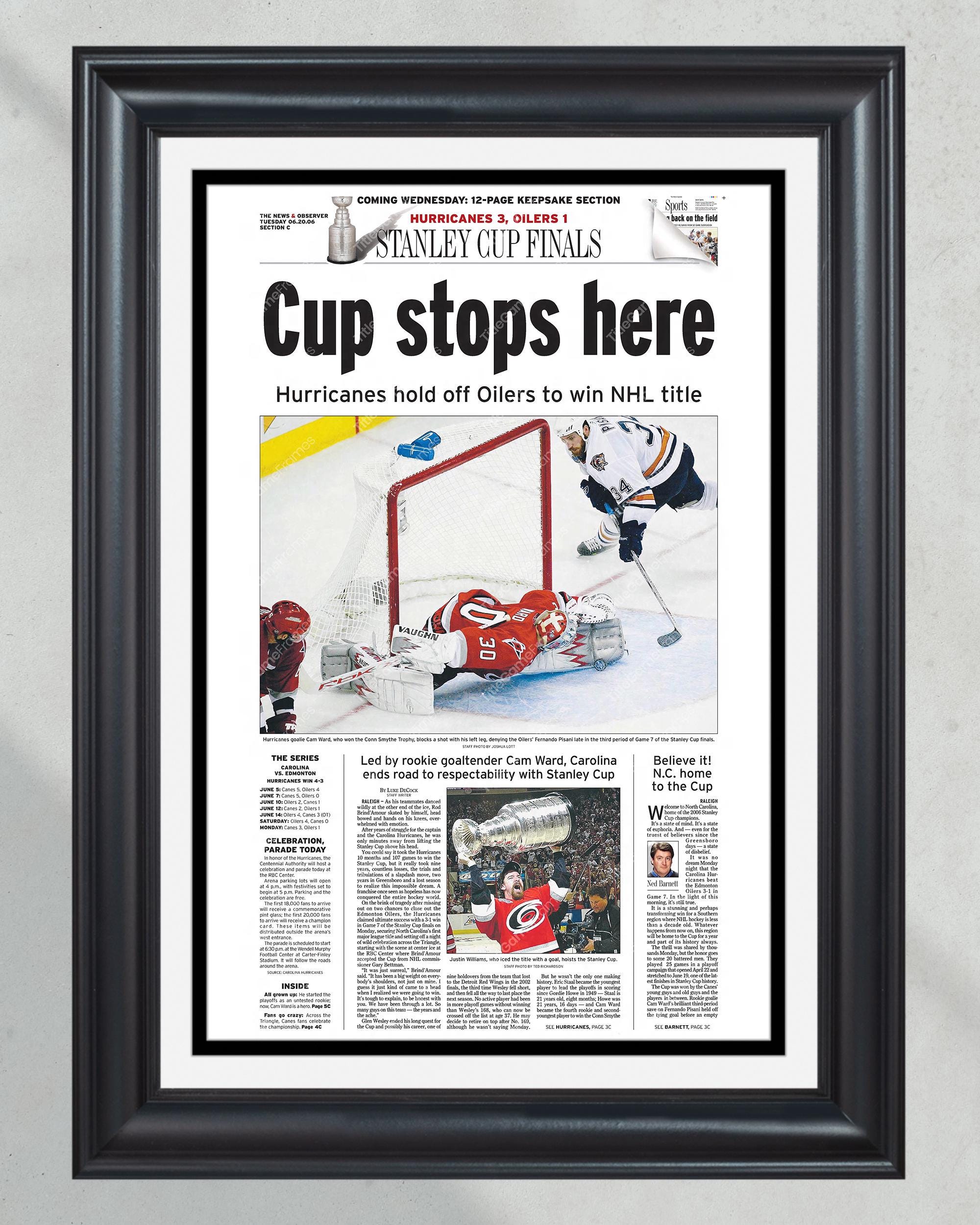 2006 Carolina Hurricanes NHL Stanley Cup Champions 'Cup Stops Here' Framed Front Page Newspaper PT61071
