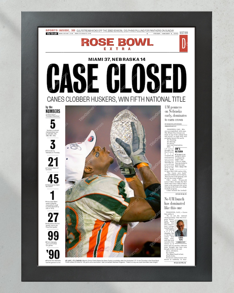 May include: A newspaper front page with the headline "CASE CLOSED" in bold black letters. The subheading reads "CANES CLOBBER HUSKERS, WIN FIFTH NATIONAL TITLE". The image shows a football player holding up a trophy. The newspaper is from the 2002 Rose Bowl game.