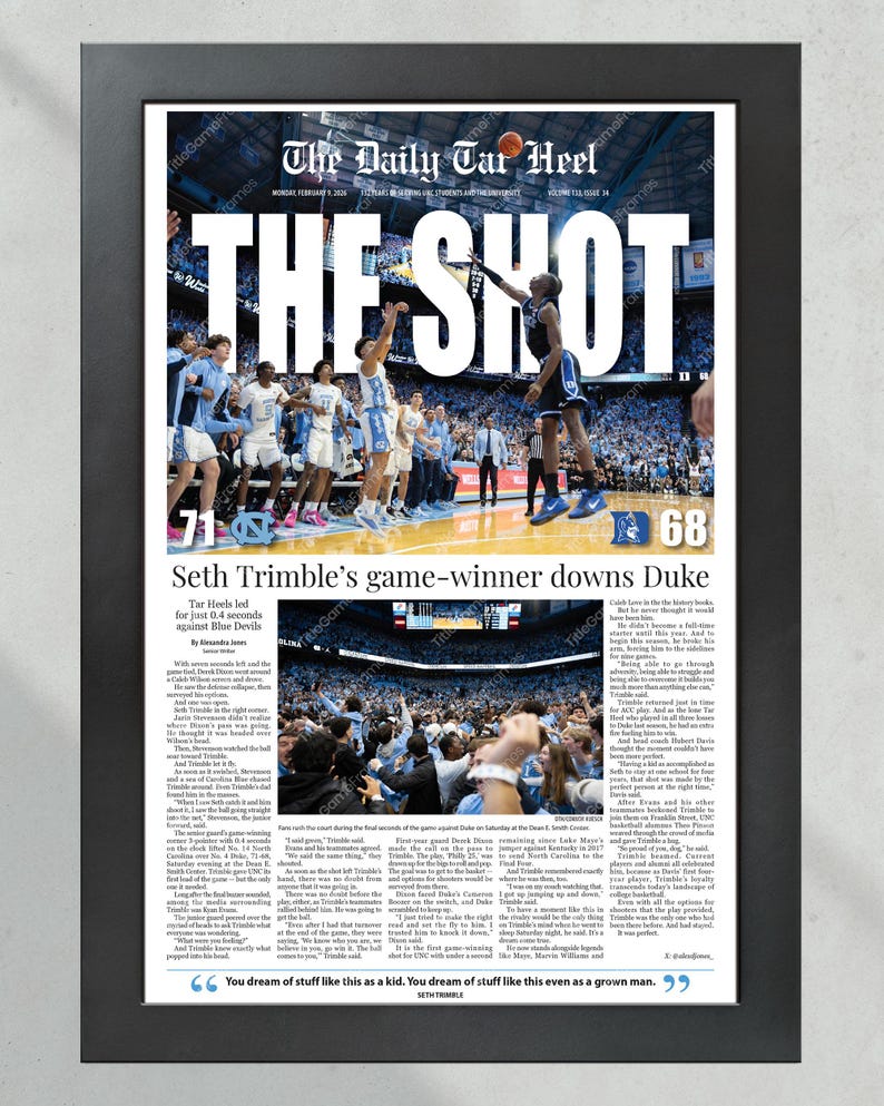May include: A framed newspaper page titled "The Daily Tar Heel" with the headline "THE SHOT." The image shows a basketball game with the score 71-68. Text reads "Seth Trimble's game-winner downs Duke." A quote at the bottom says, "You dream of stuff like this as a kid."