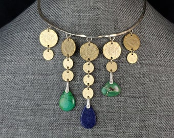 Whimsical lapis and turquoise mingle with special thirteen gold plated pewter medallions on sterling choker. No two alike!