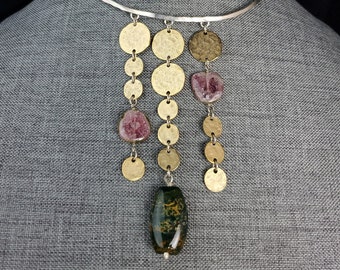 Water melon quartz, chrysocolla pendant, hand hammered sterling choker, gold plated pewter medallions. Only one.