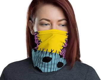May include: A yellow, pink, and blue face mask with a stitched pattern. The mask is made of a soft, breathable fabric and is perfect for everyday wear.