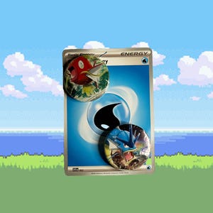 Puede incluir: Una carta coleccionable de Pokémon con dos botones redondos. Uno muestra una criatura roja con forma de pez, y el otro un dragón azul. La carta es azul con un símbolo de energía de agua.
