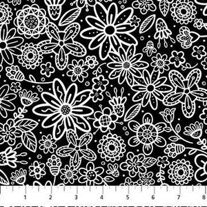 May include: Black and white floral fabric with a repeating pattern of stylized flowers and leaves. The design features various flower shapes and sizes, with white outlines on a black background. A ruler is at the bottom.