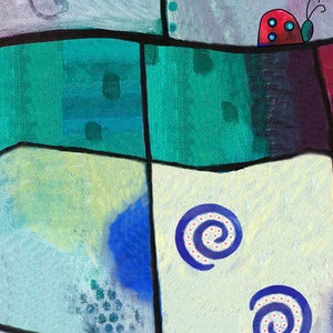 May include: Abstract painting with a patchwork design in shades of blue, green, and yellow. The painting features two blue spirals with white dots on a white background.