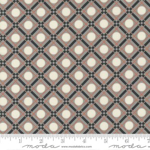 May include: White fabric with a gray and pink diamond pattern and white circles. The fabric has a subtle texture.