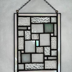 Geometric Stained Glass Panel with Clear Glass and White Opalescent Glass Accents and Frame