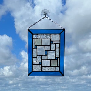 Geometric Stained Glass Panel with Clear Textured Glass, Teal Blue Accents and Teal Blue Glass Frame