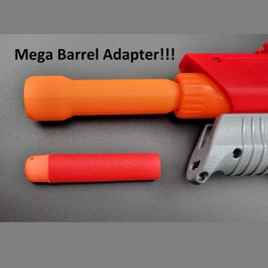 May include: An orange and red Mega Barrel Adapter with the text "Mega Barrel Adapter!!!" is shown. The adapter is attached to a red and gray toy gun. A red foam dart is next to the adapter.