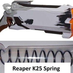 May include: A black spring in a clear plastic bag labeled "Reaper K25 Spring". The spring is for a toy gun, possibly a Nerf gun.