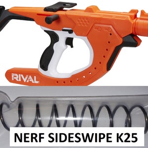 May include: An orange and white Nerf Rival Sideswipe K25 blaster with a black spring in a clear plastic bag. The blaster has a black handle and a black trigger. The blaster is labeled "Rival" and "Sideswipe K25".