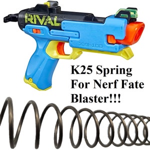 May include: A blue and yellow Nerf Rival K25 spring replacement for the Nerf Fate blaster. The spring is black and coiled.