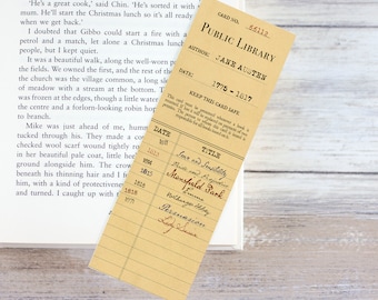 May include: A vintage library card with the title "Pride and Prejudice" by Jane Austen. The card is brown with white text and includes the publication date of 1813.