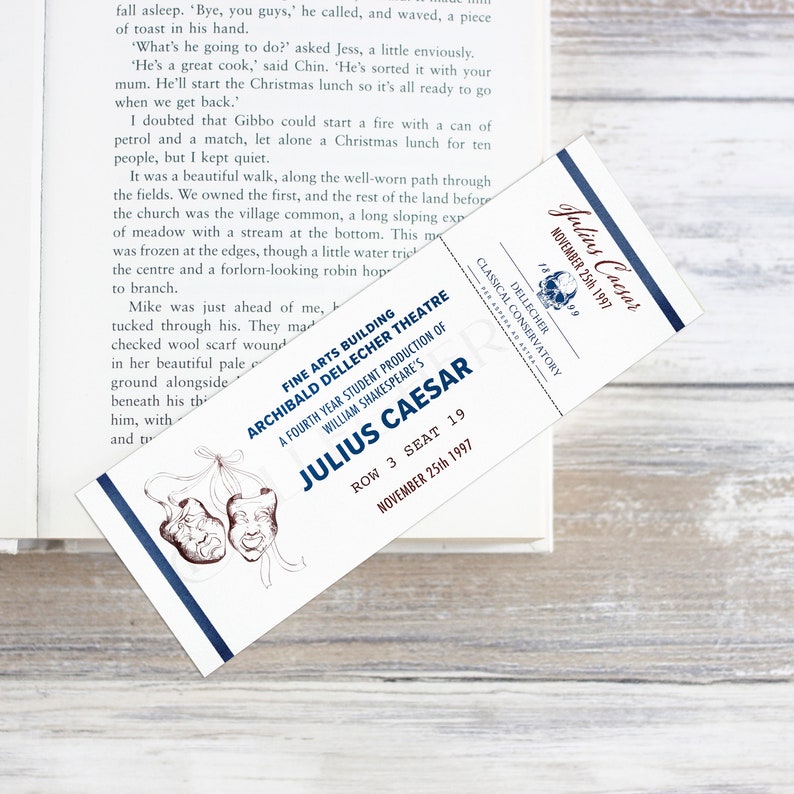 May include: A theater ticket for "Julius Caesar" with the date November 25th, 1997, and the Archibald Dellecher Theatre. The ticket has a blue and white design with theater masks.