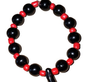 baby Azabache  evil eye jet hand